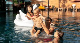 Family enjoying pool