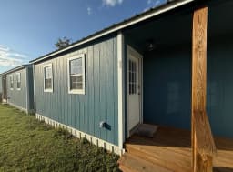Blue Duplex D Cabins Entrance